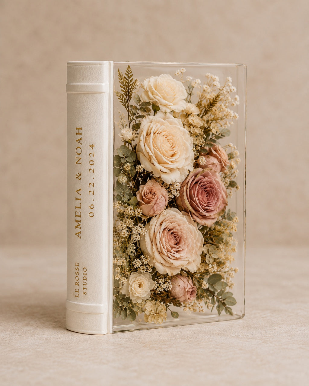 Le Rosse Studio Botanical Vow Book with preserved ivory and blush wedding flowers in clear resin and ivory book spine