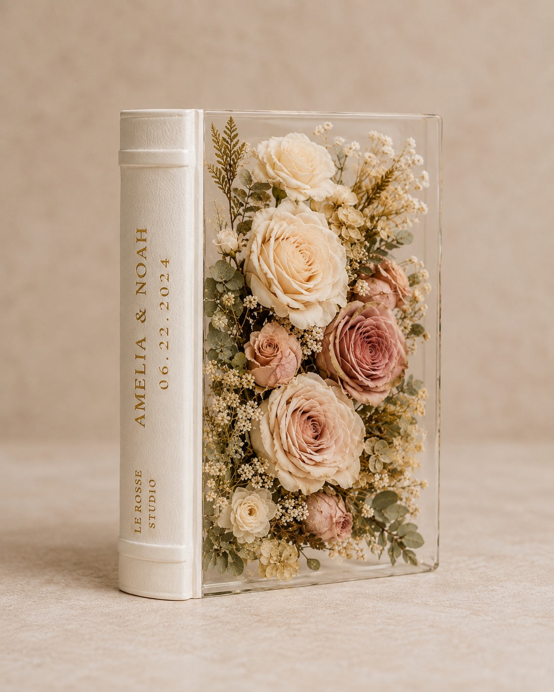 Le Rosse Studio Botanical Vow Book with preserved ivory and blush wedding flowers in clear resin and ivory book spine