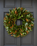 Classic Charleston Magnolia Wreath on a charcoal door