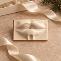 A Christmas Kiss ivory sculptural lips keepsake design preview.