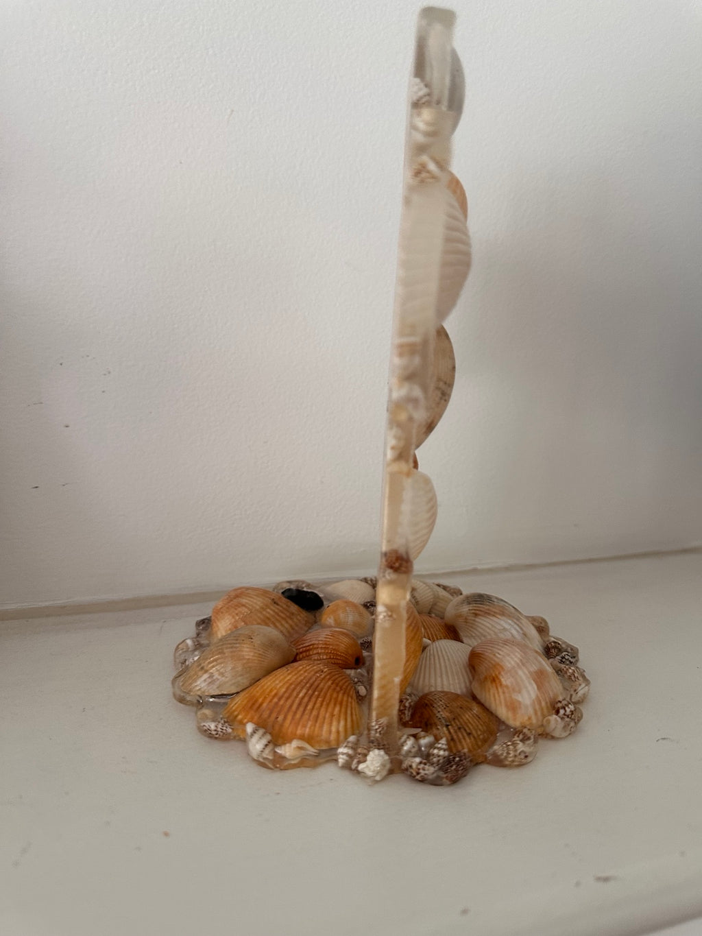 Side view showing the resin depth and freestanding base