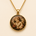 Le Rosse Studio Guardian Angel cherub pendant on a soft ivory background
