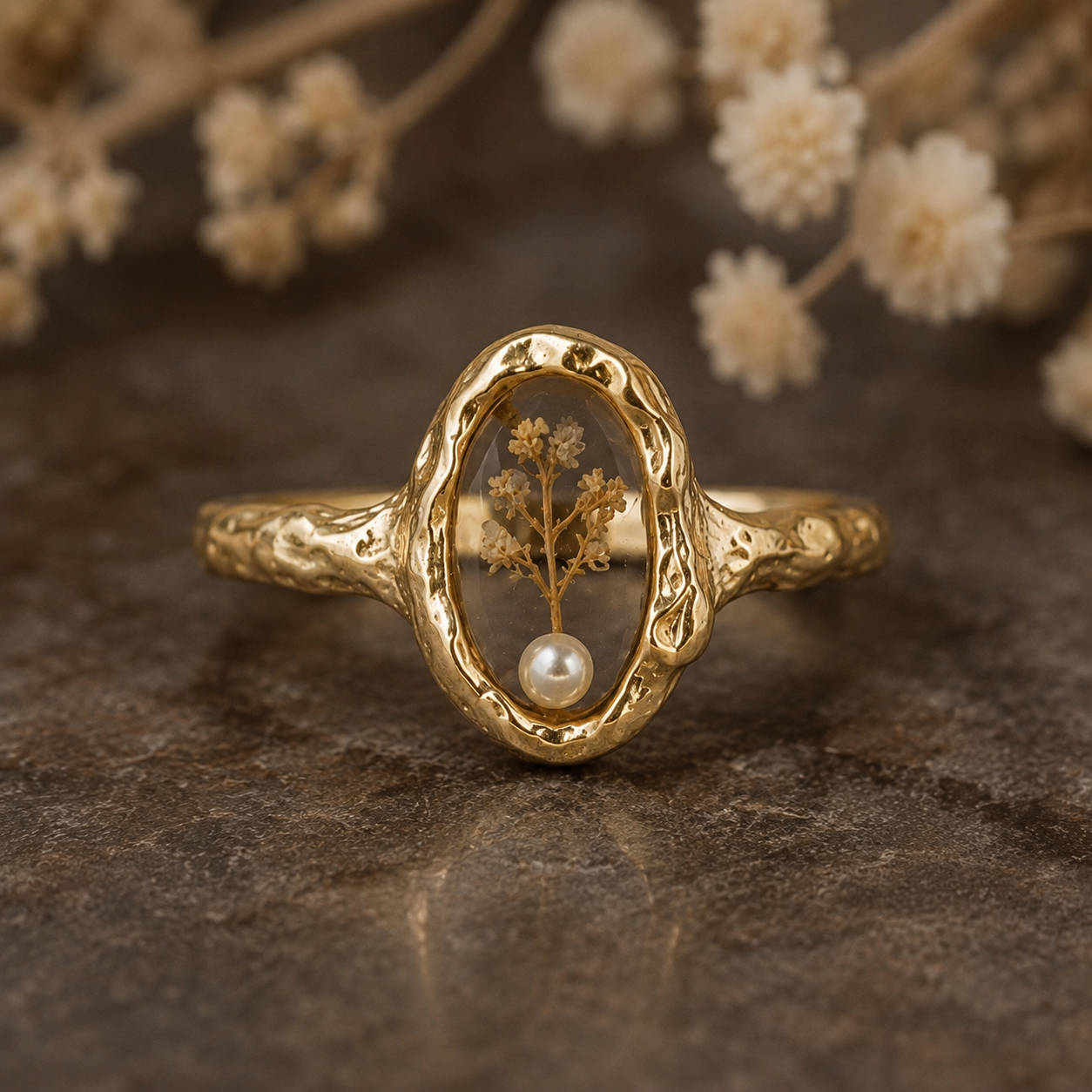 Le Rosse Studio gold memorial botanical relic ring with preserved botanical keepsake inside a clear oval setting