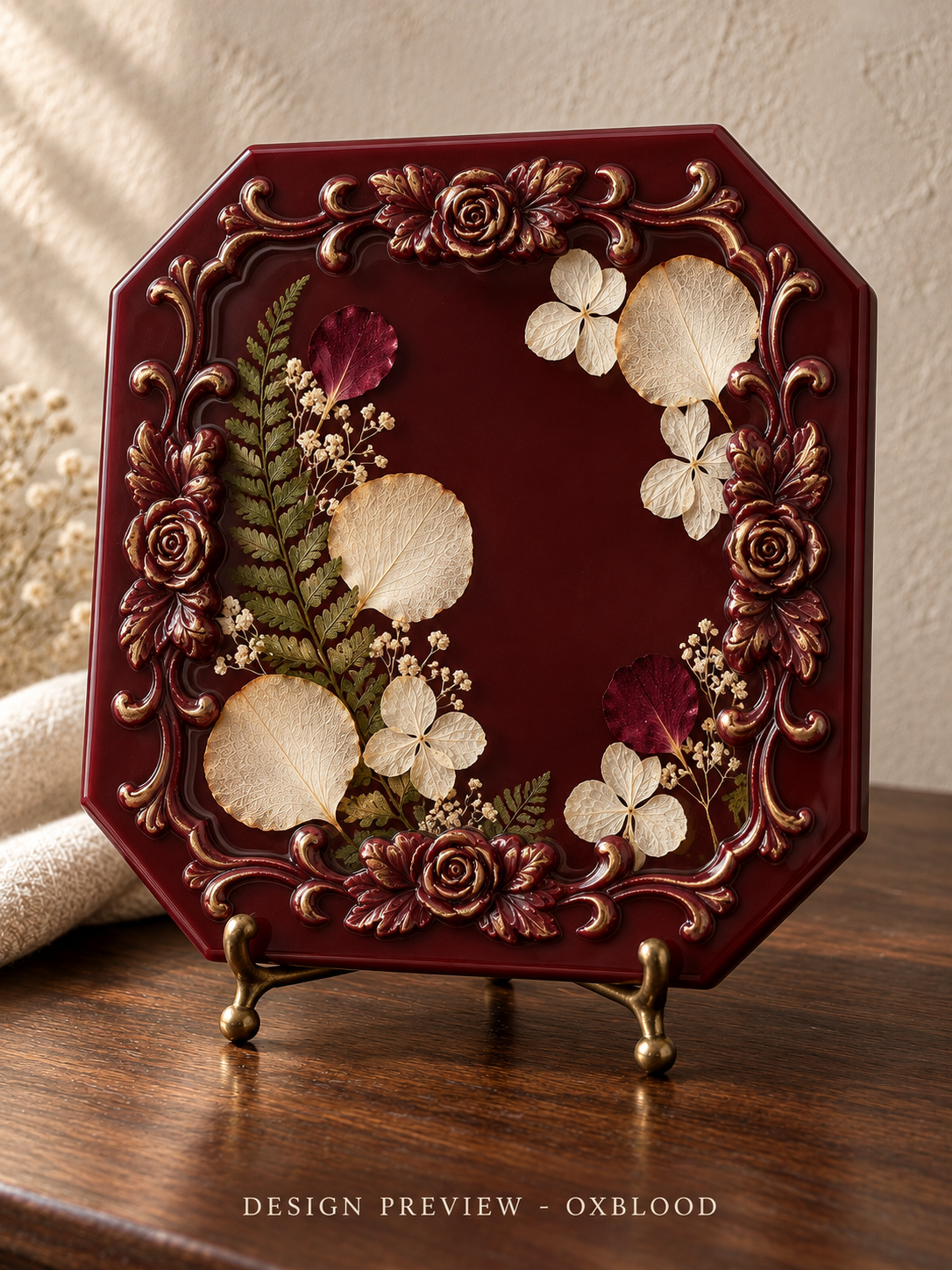 AI design preview of Rose & Remembrance resin keepsake plaque in oxblood with preserved flowers and ornate rose relief