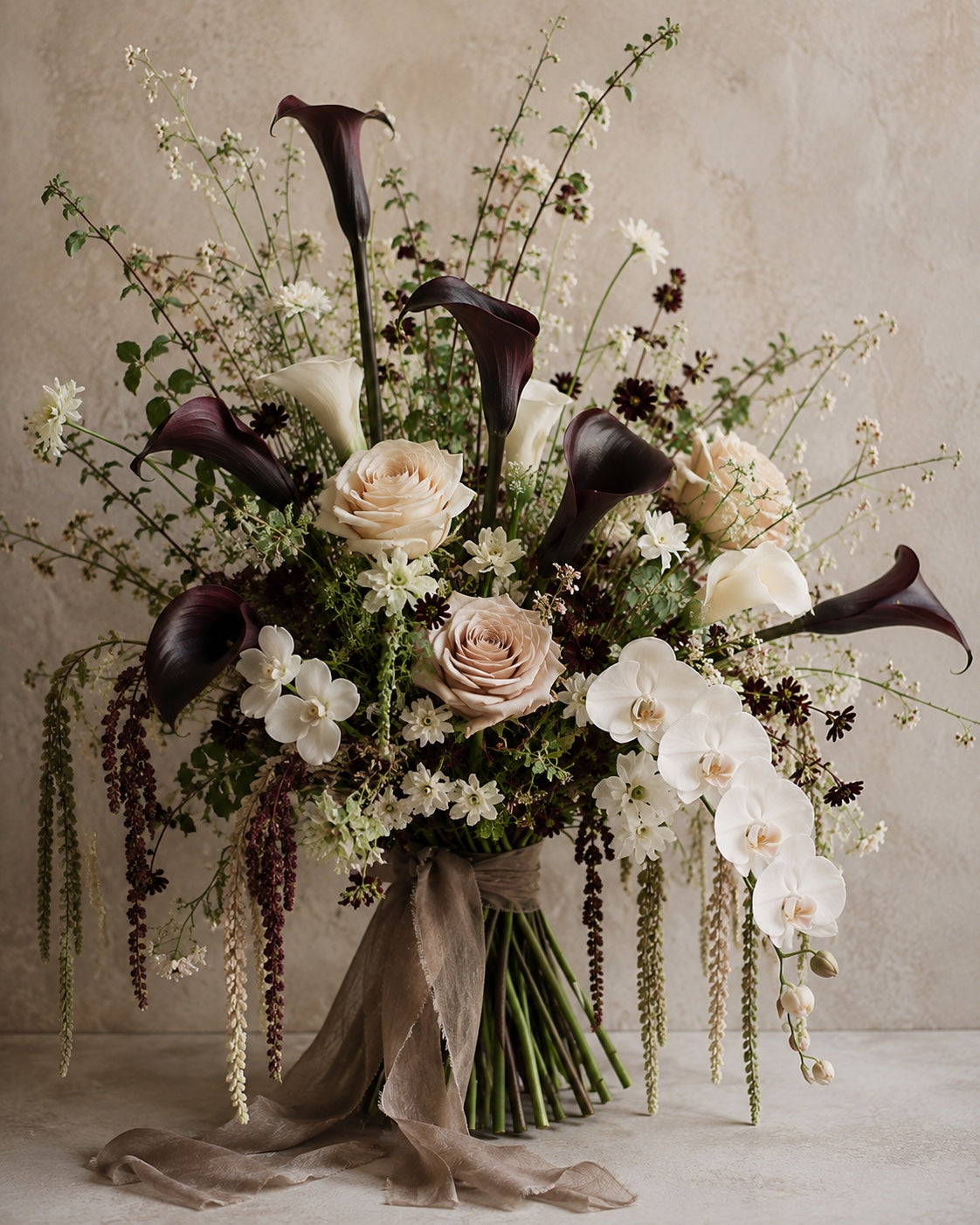 Le Rosse Studio sculptural calla floral rental design in burgundy, ivory, olive, and antique gold