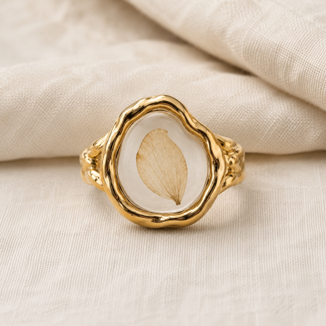 Le Rosse Studio Single Petal Botanical Relic Ring in Gold Finish with one preserved petal in a clear botanical window
