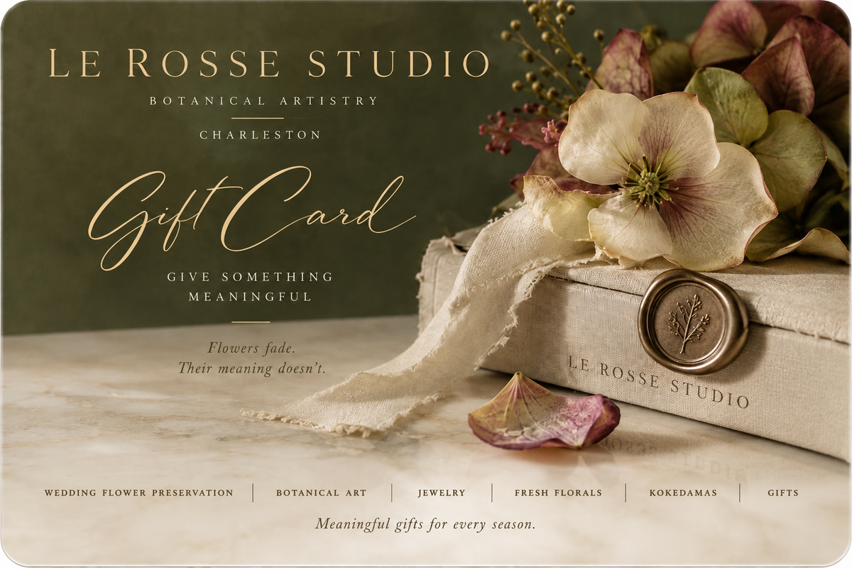 Le Rosse Studio gift card in olive and ivory with preserved botanicals and antique brass details