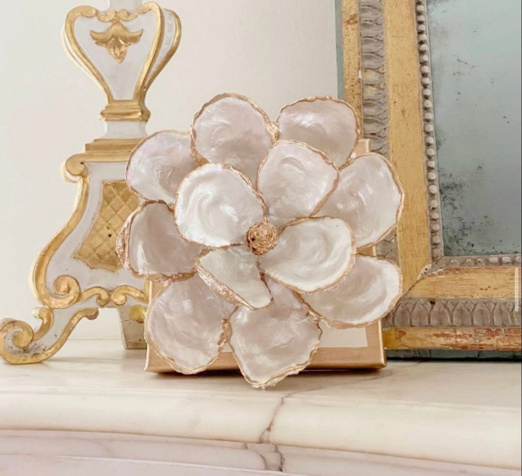 Handmade oyster-shell magnolia with gold edges on included square support